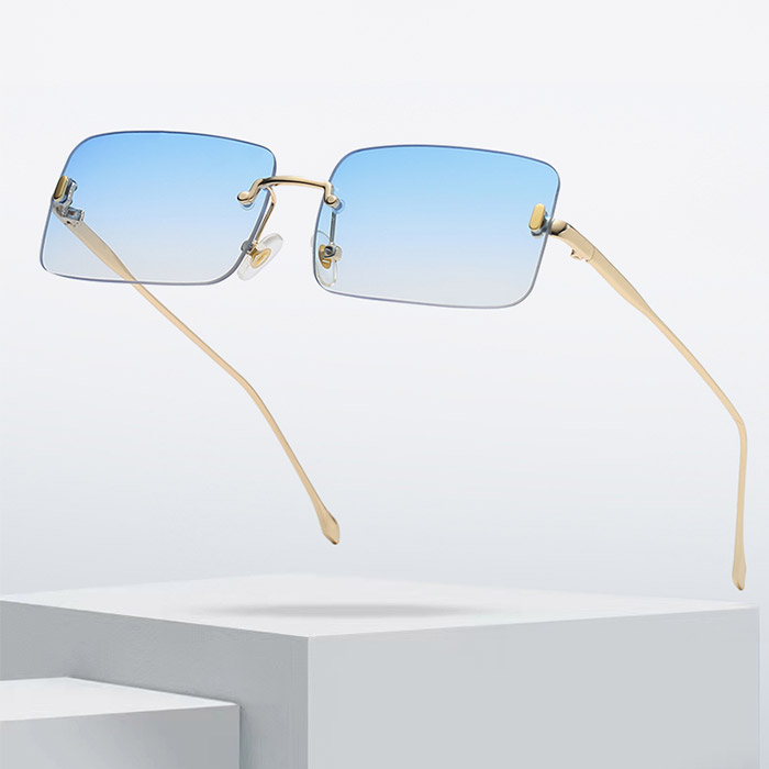 Rektangulära solglasögon med blått glas