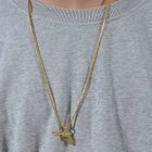 Pistol halsband i guld till herr